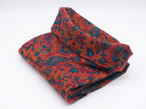 Warmer Poncho mit Paisley Muster, rotorange / blau